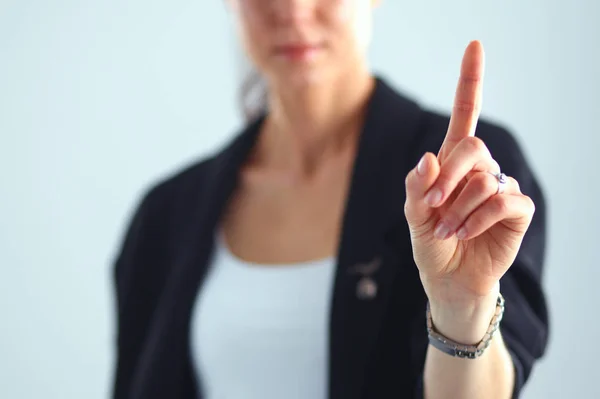 Frau berührt imaginären Bildschirm mit dem Finger — Stockfoto