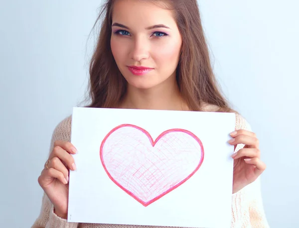 Portrait of young beautiful woman showing gift card. Valentines Day — Stock Photo, Image