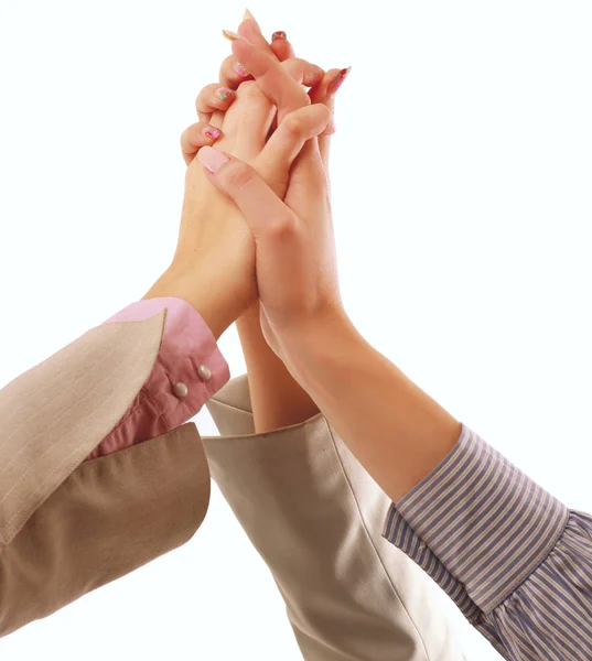 Businesswomen putting their hands together, isolated on white — Stock Photo, Image