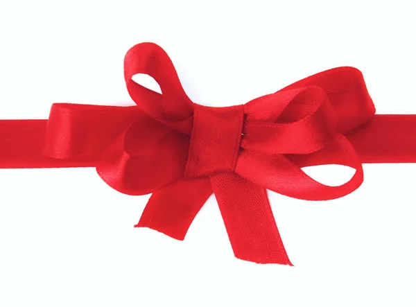 A red ribbon shaping heart , isolated on white background — Stock Photo, Image