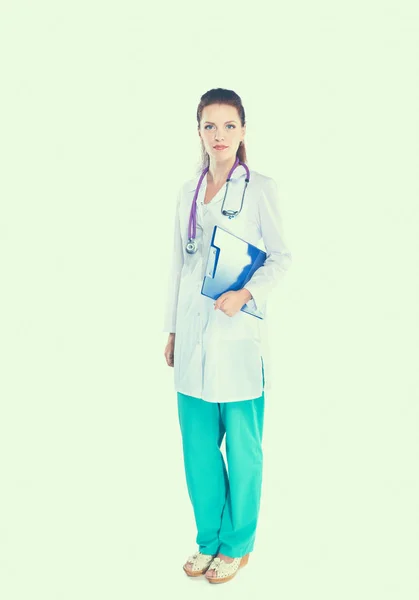 Smiling female doctor with a folder in uniform standing at hospital — Stock Photo, Image