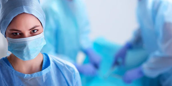 Team surgeon at work in operating room — Stock Photo, Image