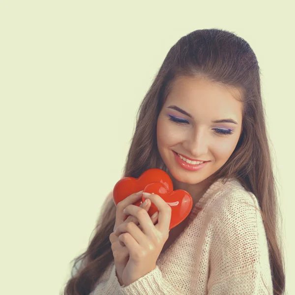 Beautiful woman hold red hear, isolated on gray background — Stock Photo, Image