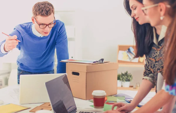 Young business people working at office on new project — Stock Photo, Image