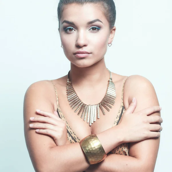 Young beautiful brunette woman with beads — Stock Photo, Image