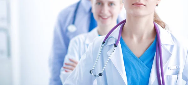 Portrait of doctor in front of colleagues — Stock Photo, Image