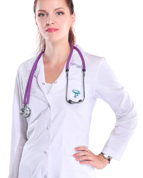 Portrait of young woman doctor with white coat standing in hospital — Stock Photo, Image