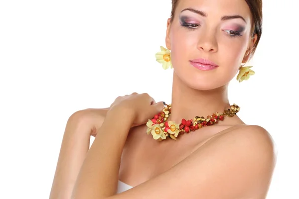 Portrait of young beautiful brunette woman in beads — Stock Photo, Image