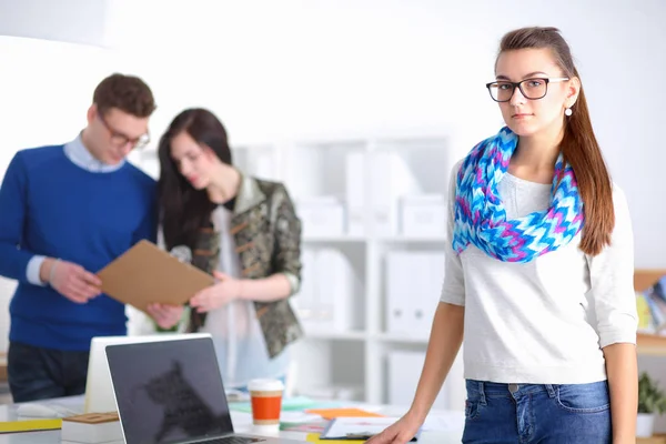 Young business people working at office on new project — Stock Photo, Image