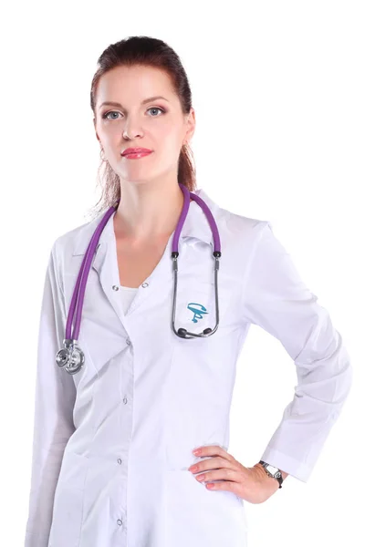 Portrait of young woman doctor with white coat standing in hospital — Stock Photo, Image