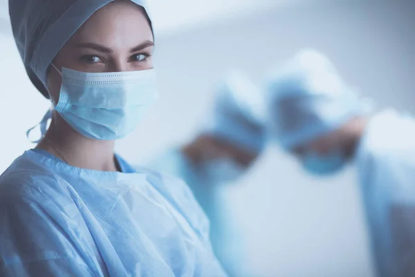 Team surgeon at work in operating room — Stock Photo, Image