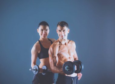 Dambılı atletik erkek ve kadın