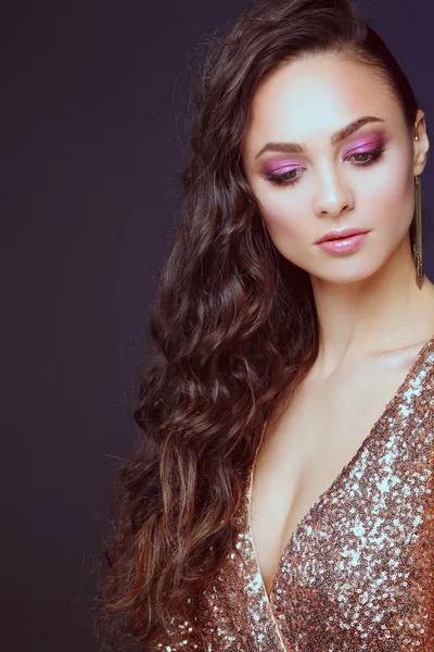 Beautiful young woman in evening dress on black background — Stock Photo, Image