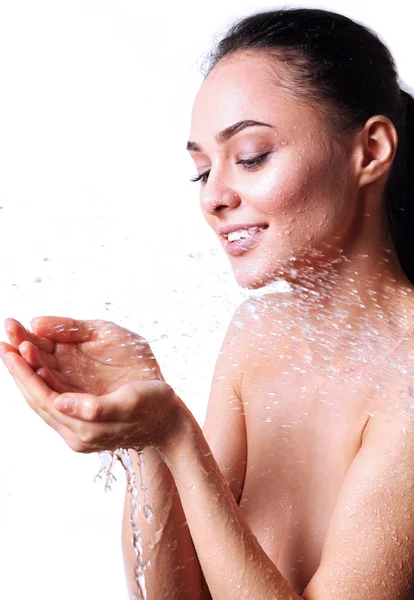 Young beautyful woman under shower in bathroom — Stock Photo, Image