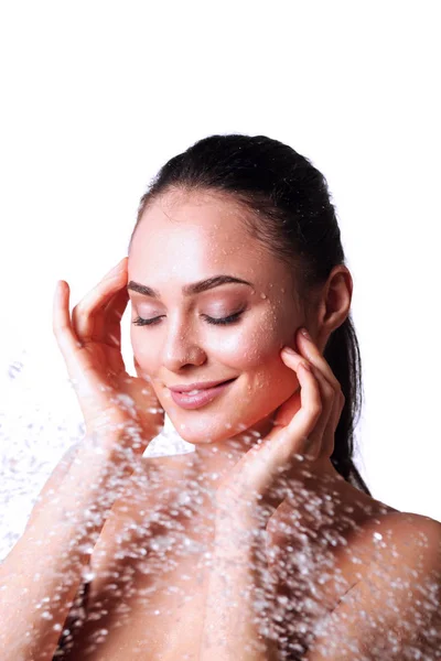 Young beautyful woman under shower in bathroom — Stock Photo, Image