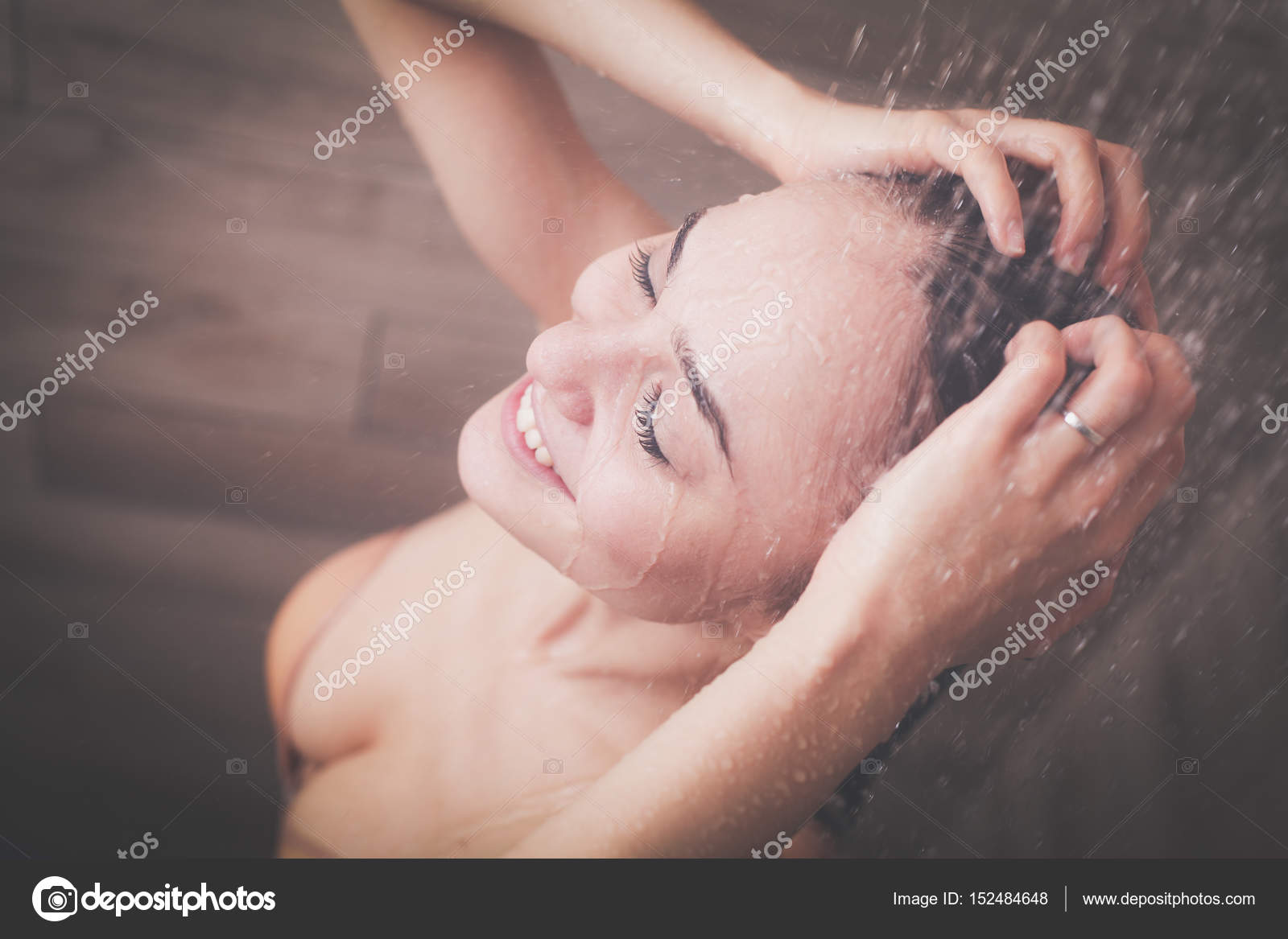 Young beautyful woman under shower in bathroom Stock Photo by  ©Lenets_Tatsiana 152484648