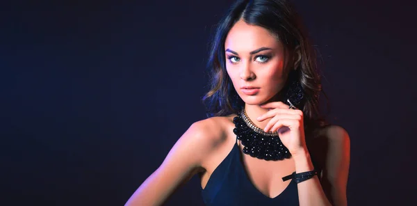 Portrait of a beautiful woman with necklace — Stock Photo, Image