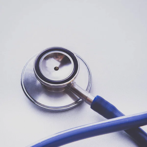 Stethoscope with reflection. stethoscope background. stethoscope with reflection on glossy background