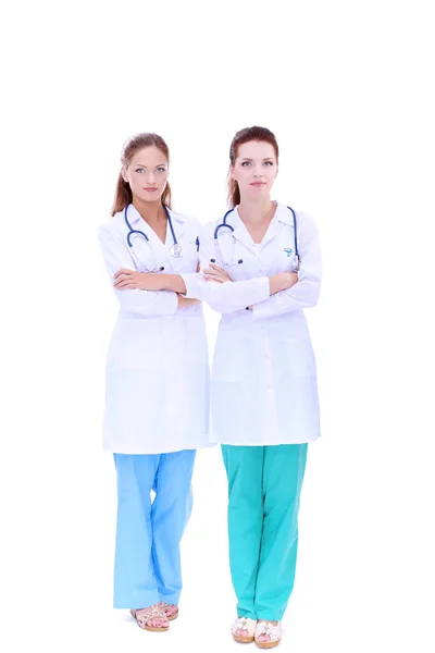 Twee jonge vrouw dokter, staande in het ziekenhuis — Stockfoto