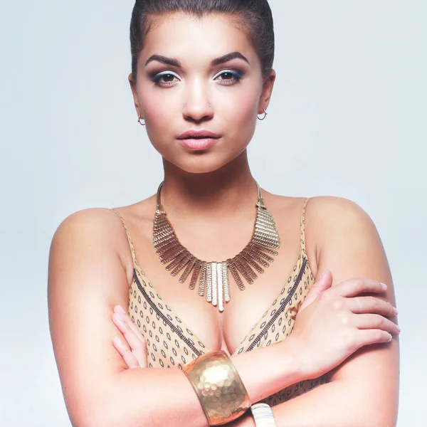 Young beautiful brunette woman with beads — Stock Photo, Image