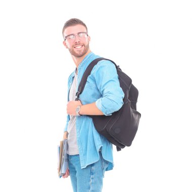 Okul çantası beyaz arka plan üzerinde izole kitap holding ile genç erkek öğrenci