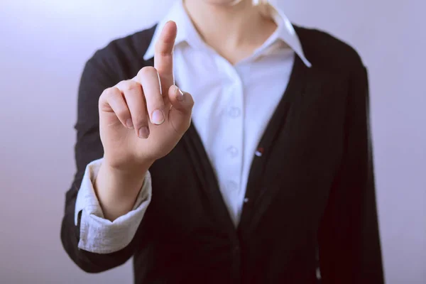 Biznes kobieta palcem wskazującym. Na białym tle na tle gejów — Zdjęcie stockowe