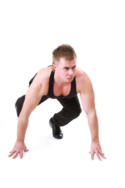 Pełna długość Portret mężczyzny fitness uruchomiona na białym tle na białym tle — Zdjęcie stockowe