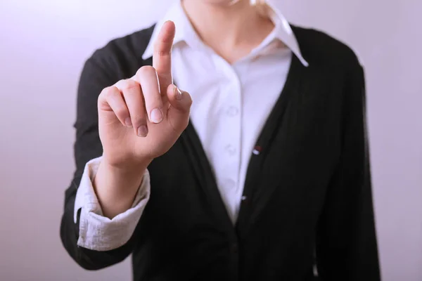 Biznes kobieta palcem wskazującym. Na białym tle na tle gejów — Zdjęcie stockowe