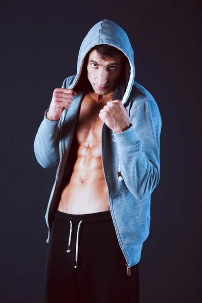 Profile view of young man practicing boxing .Personal instructor. Personal training. — Stock Photo, Image