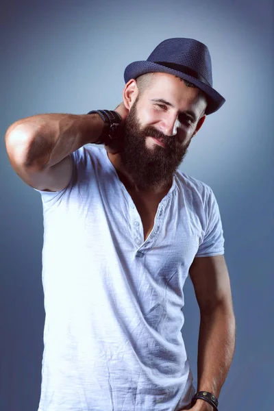 Portrait of handsome man standing, isolated on grey background — Stock Photo, Image