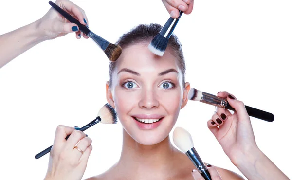 Closeup portrait picture of beautiful woman with brushes — Stock Photo, Image