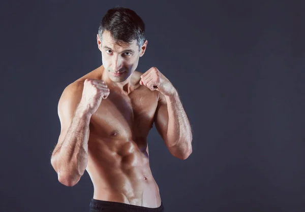 Profile view of young man practicing boxing .Personal instructor. Personal training. — Stock Photo, Image