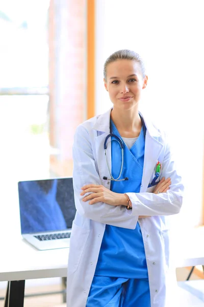 Woman doctor standing near window at hospital. Woman doctor — Stock Photo, Image