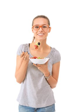 Sağlıklı yemek yiyen güzel bir kız. Güzel kız.