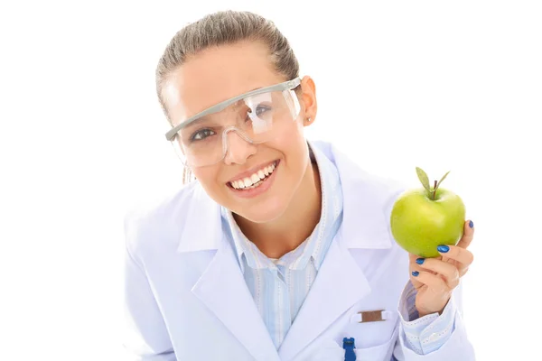 Zahnärztin Ärztin hält grünen frischen Apfel in der Hand und Zahnbürste. Zahnärzte. Ärztinnen — Stockfoto