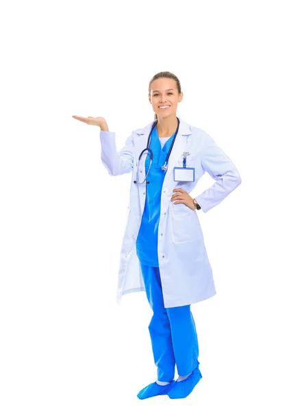 Beautiful young woman in white coat posing with hand in pocket. Woman doctor — Stock Photo, Image