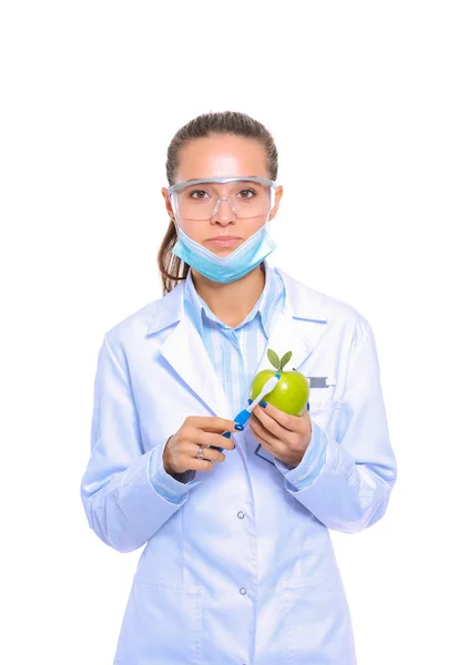 Dentist medical doctor woman hold green fresh apple in hand and tooth brush. Dentist doctors. Woman doctors Stock Picture