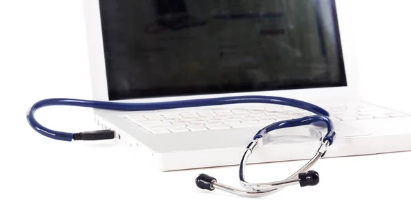 Medical stethoscope on the keyboard of pc — Stock Photo, Image