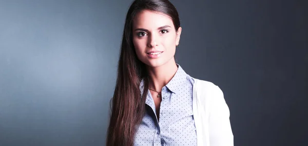 Retrato de una mujer de negocios, sobre fondo oscuro — Foto de Stock