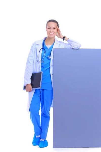 A female doctor with a blank billboard. Woman doctor — Stock Photo, Image