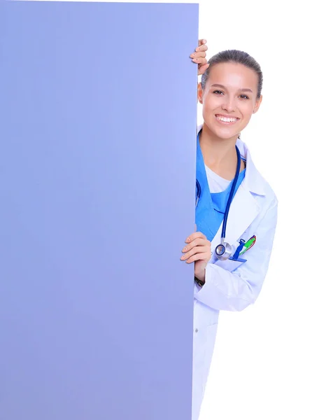 A female doctor with a blank billboard. Woman doctor — Stock Photo, Image