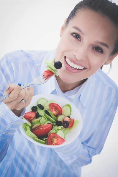 Uma linda garota comendo comida saudável. Menina bonita — Fotografia de Stock