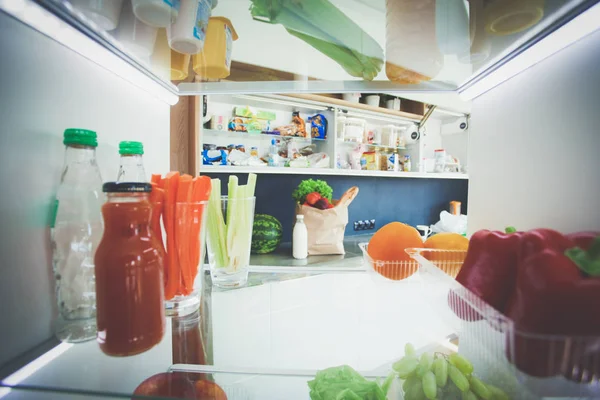 Open refrigerator with fresh fruits and vegetable. Open refrigerator — Stock Photo, Image