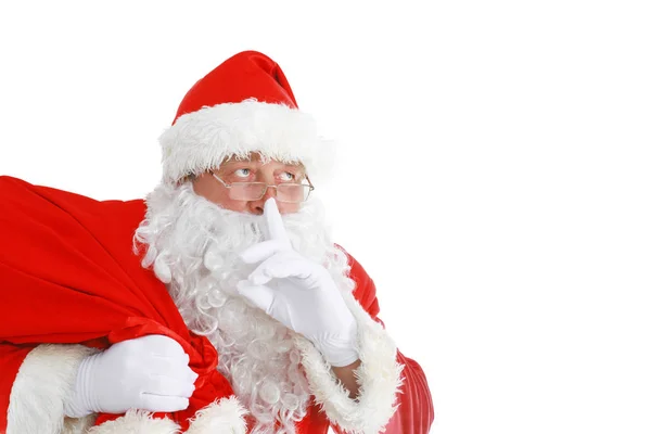 Real Papai Noel carregando grande saco cheio de presentes, isolado no fundo branco — Fotografia de Stock