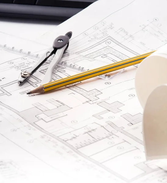 Architectural plans, compass and ruler on the desk — Stock Photo, Image