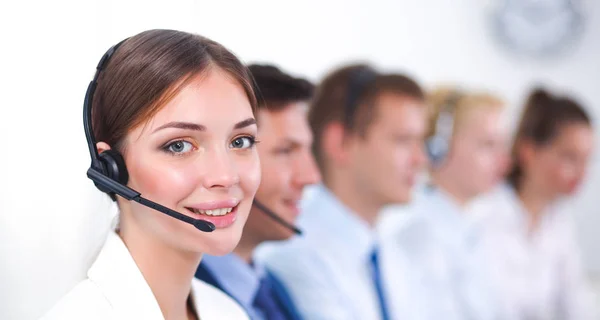 Attractive positive young businesspeople and colleagues in a call center office — Stock Photo, Image