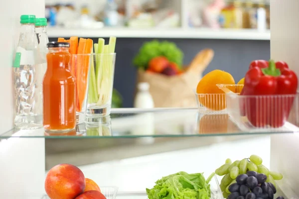 Open refrigerator with fresh fruits and vegetable. Open refrigerator — Stock Photo, Image