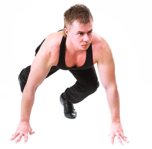 Retrato de comprimento total de um homem de fitness correndo isolado em um fundo branco — Fotografia de Stock