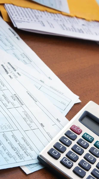 Calculator with business paper on the desk — Stock Photo, Image