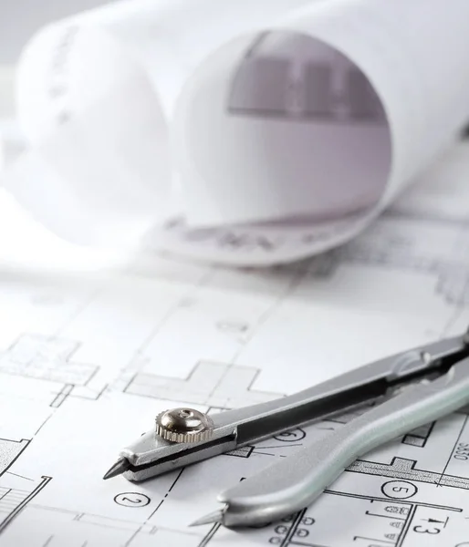 Architectural plans, compass and ruler on the desk — Stock Photo, Image